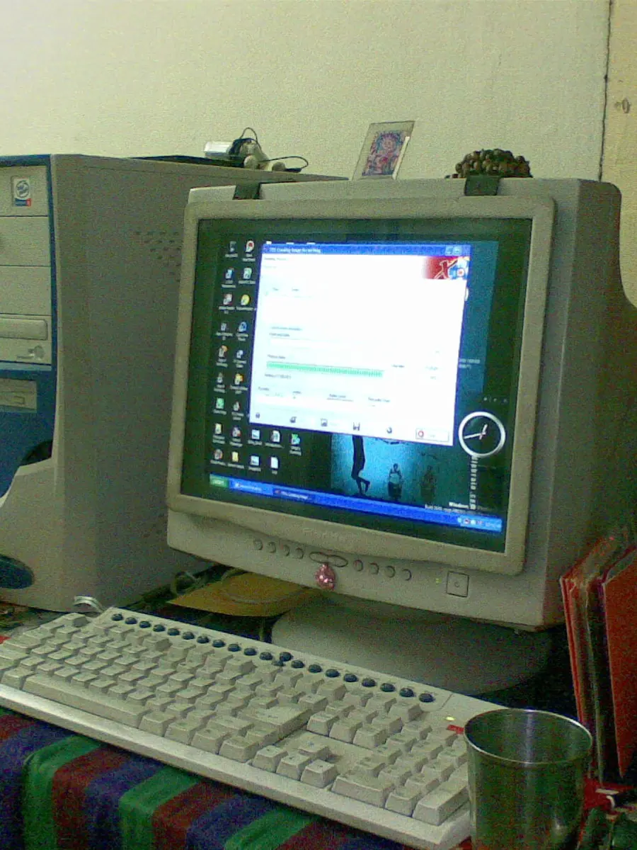 A CRT computer monitor standing on a desk
