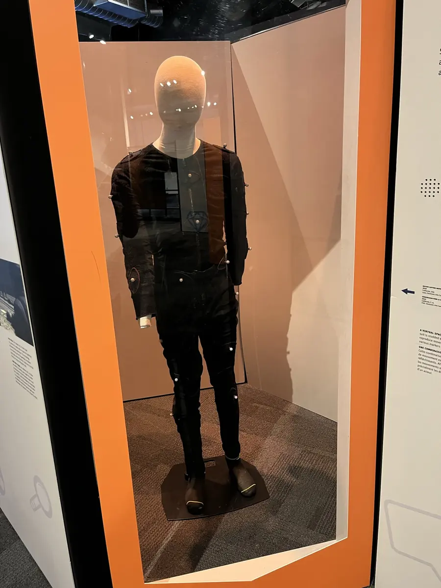 A motion capture suit with reflective markers on a display mannequin
