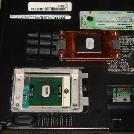 Thermal compound applied to a processor on a laptop board