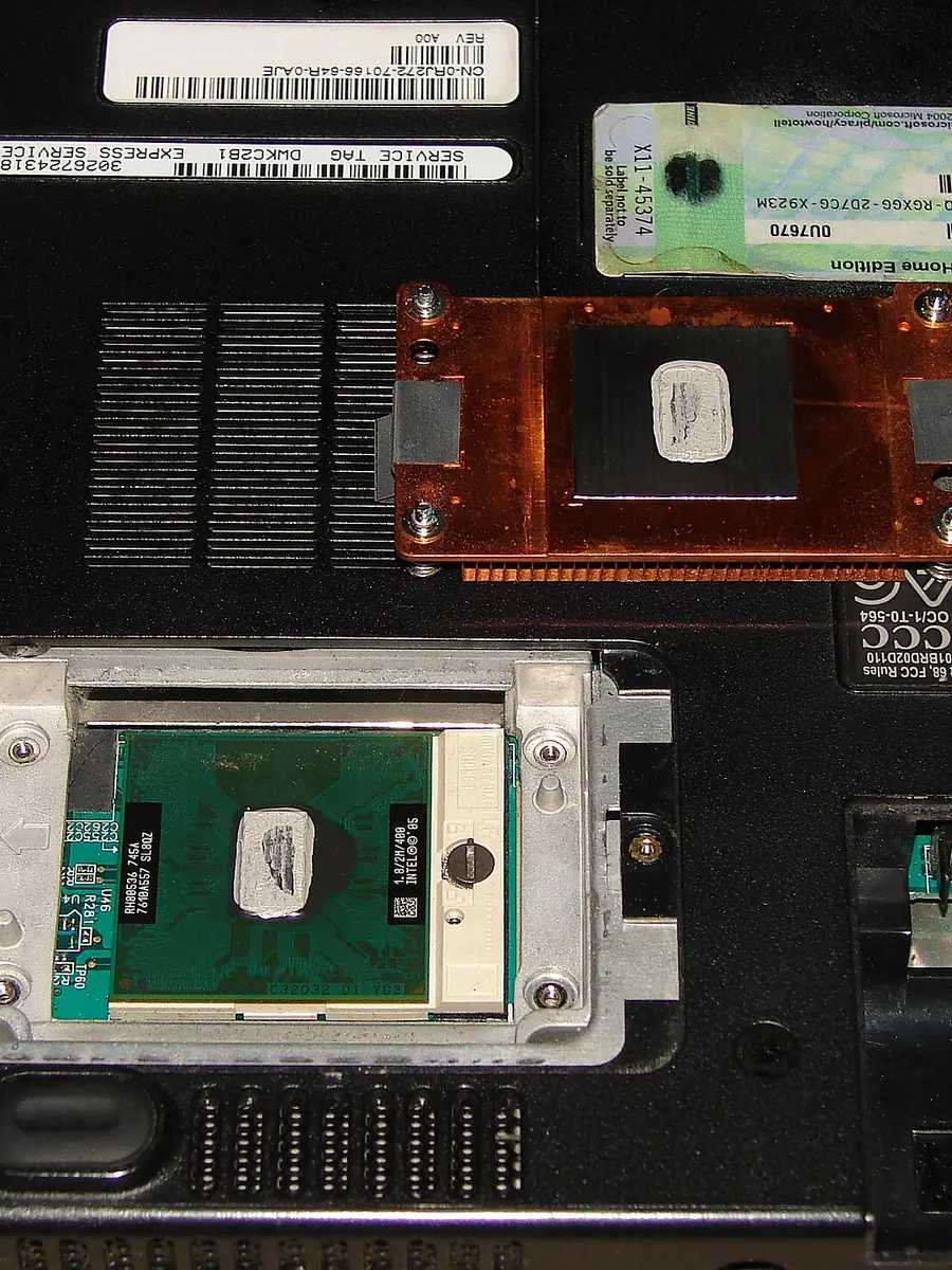 Thermal compound applied to a processor on a laptop board