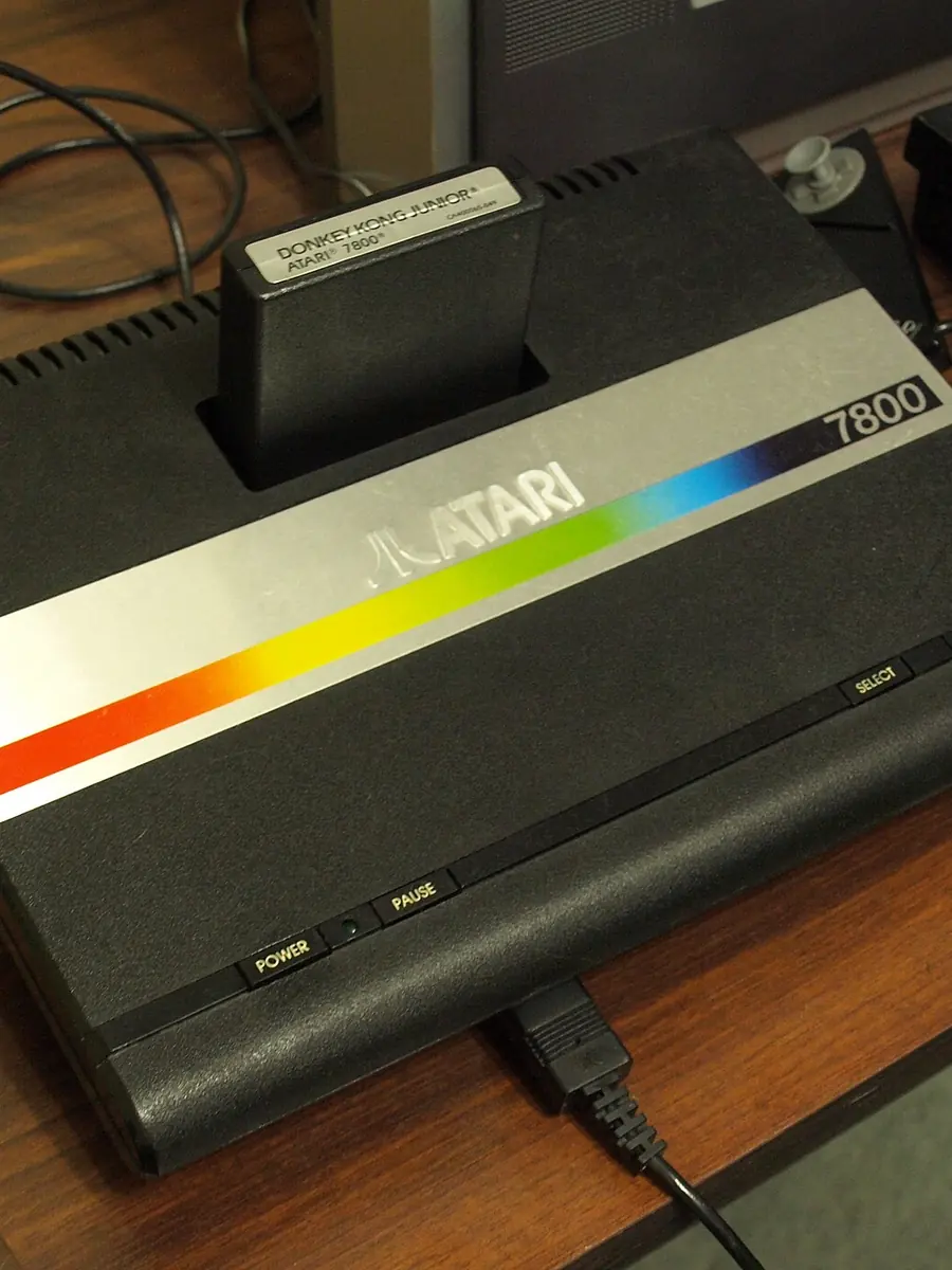 An Atari console with a cartridge inserted